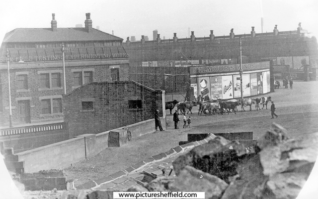 Sheffield Castle excavations recorded by J.B. Himsworth. Approach to Shambles Slaughter Houses from Blonk Street, Blonk Street Bridge and Sheffield Testing and Experimenting Works, left, Furnival Road in background
