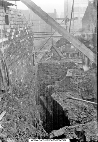 Sheffield Castle excavations recorded by J.B. Himsworth. Remains of a stone vaulted room or dungeon on the Market Site