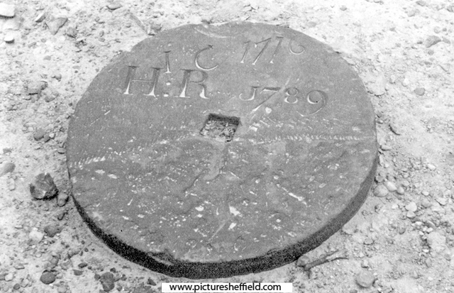 Grinders gravestone in Attercliffe Chapel of Ease Churchyard, Hill Top, Attewrcliffe Common. Inscription reads, H.R., 1716-1789, diameter 20 inch