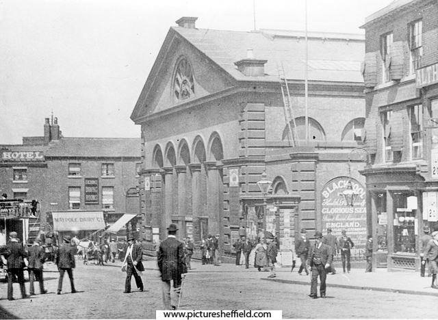 Norfolk Market Hall, Haymarket, prior to the rebuilding of the west front 1904-5. Exchange Street in background, including No. 3, Maypole Dairy Co.