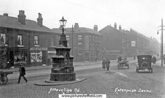 Drinking fountain at the junction of Attercliffe Road and Effingham Road with Nos. 469 - 471 Old Green Dragon public house (also called the Green Dragon) and Baldwin Street in the background