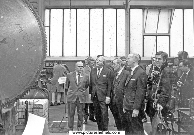 Prime Minister, Edward Heath is shown a giant circular saw by Tom Burleigh (right of Prime Minister), chairman of Firth Brown Tools and Master Cutler during his visit to Firth Brown Tools Ltd., Speedicut Works, Carlisle Street East