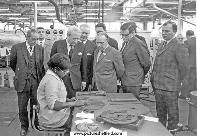 Prime Minister, Edward Heath is shown circular sawmaking by an employee during his visit to Firth Brown Tools Ltd., Speedicut Works, Carlisle Street East with Tom Burleigh (left of Prime Minister), chairman of Firth Brown Tools and Master Cutler