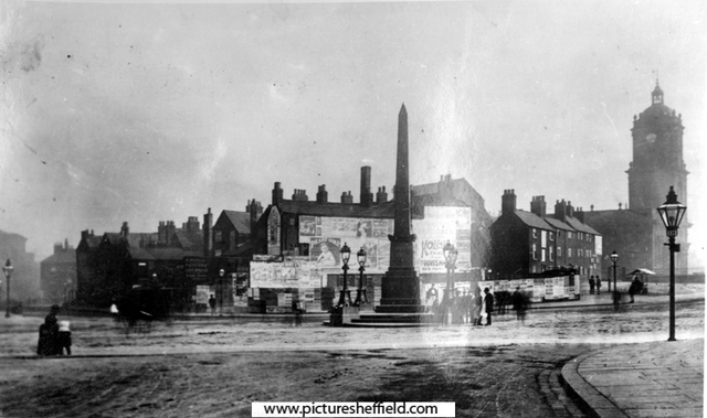 Jubilee Monolith, Town Hall Square, from Leopold Street, prior to construction of Town Hall. Pinstone Street, Cheney Square and St. Paul's Church, right, Surrey Street, left, showing rear of premises fronting New Church Street 	