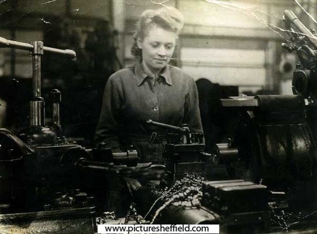 Audrey Watson behind a lathe at Hadfields, Sheffield