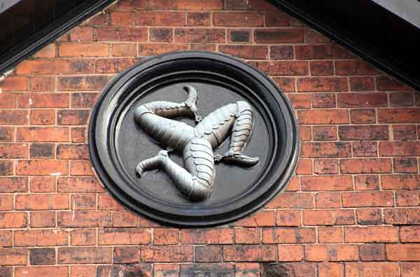 Trademark carved onto Meersbrook Works, former premises of Joseph Tyzack and Son Ltd, manufacturers of Curriers' and Tanners' knives, Valley Road