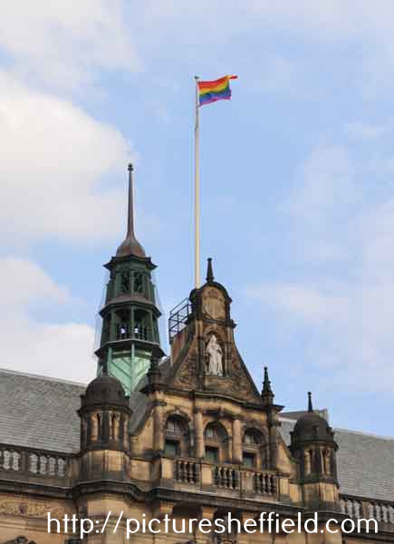 Rainbow flag flying above the Town Hall in support of lesbian, gay, bisexual and trans people