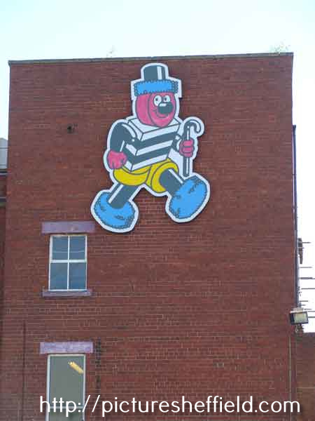 Bertie Bassett, the brand mascot of Cadbury Sheffield (formerly Geo. Bassett and Co.), confectionary manufacturers on the wall of their factory, Dutton Road