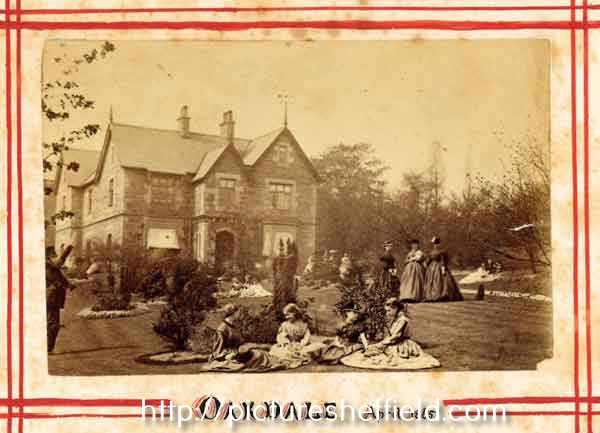 Young ladies sitting and standing in grounds outside a large house, probably Oakdale, Broomhall Park