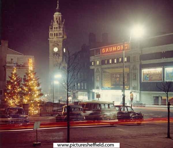Christmas illuminations in Barkers Pool showing the Gaumont Cinema and the Town Hall taken from Balm Green