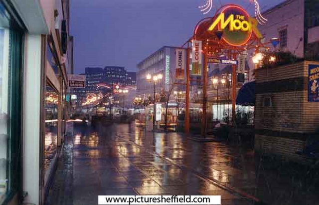 Christmas illuminations on The Moor showing Nos. 78 - 82 John Atkinson Ltd., department store to the right and the Manpower Services Commission building (Moorfoot)