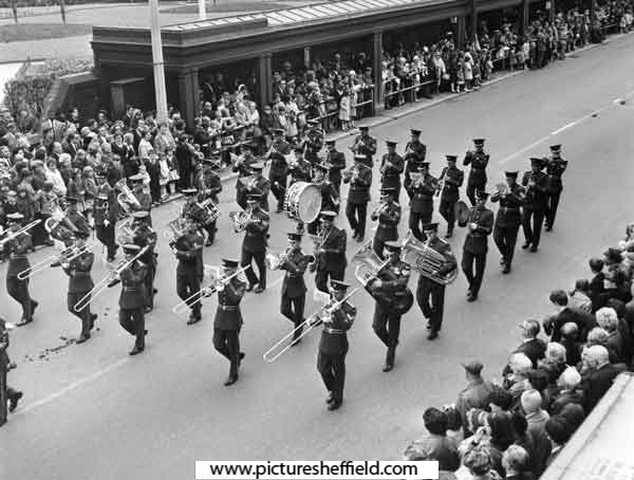 Military band at Lord Mayor's Parade marching past the Peace Gardens, Pinstone Street