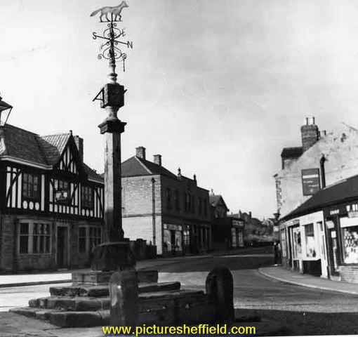 Woodhouse Cross and stocks, junction of Cross Street and Market Place (latterly Market Square),Woodhouse showing the Royal Hotel on left