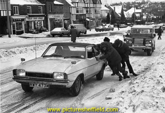 Helping a motorist on Totley Rise, Baslow Road during snow