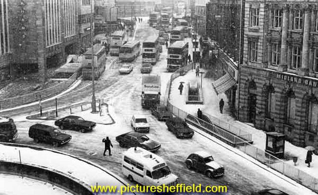Snow on Angel Street and High Street showing Midland Bank (right) and Rackhams, department store (left)