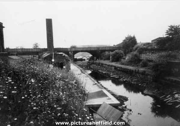 The Sheffield and South Yorkshire Navigation near to Maltravers Street showing a chimney which formerly belonged to the Sheaf Works