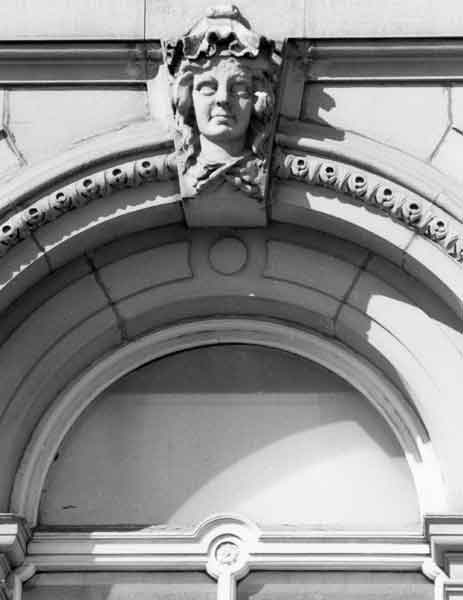 Carved stonework on front of Sheffield Water Works Company offices, Division Street, later became Transport Offices (known as Cambridge House), 