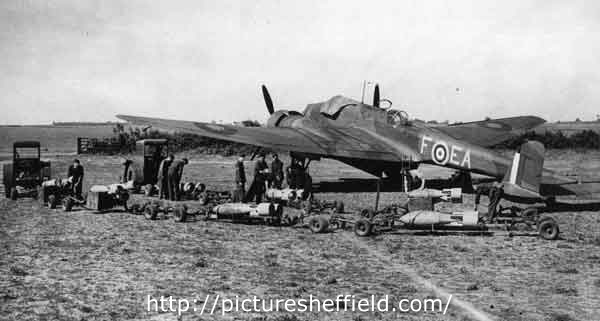 No.49 Squadron Handley Page Hampden aircraft seen here being bombed up