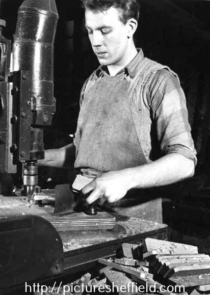 Mr Moore routing or roughly cutting to shape knife handles, Joseph Rodgers and Sons Ltd. River Lane Works at the junction of Sheaf Street and Pond Hill,