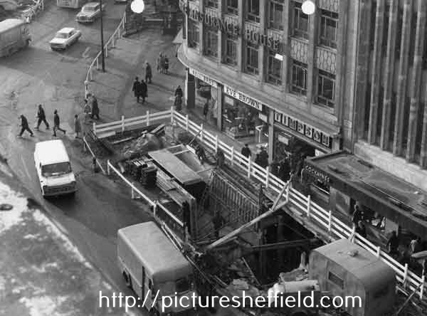 Construction of Castle Square showing (top left) High Street, (centre) Market Place shops, No.19 Eve Brown, costumier, No,21 William Timpson Ltd., shoe shop and (top) Yorkshire Insurance House