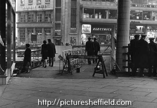 Construction of Castle Square showing (centre) Bunker and Pratley Ltd., television dealers, No. 50 High Street and (left) Marples Hotel, No. 4 Fitzalan Square