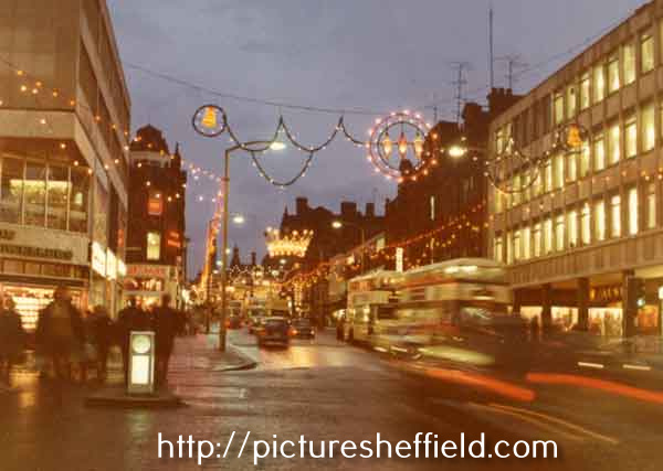 Christmas lights on Pinstone Street from junction with Furnival Gate, c.1972