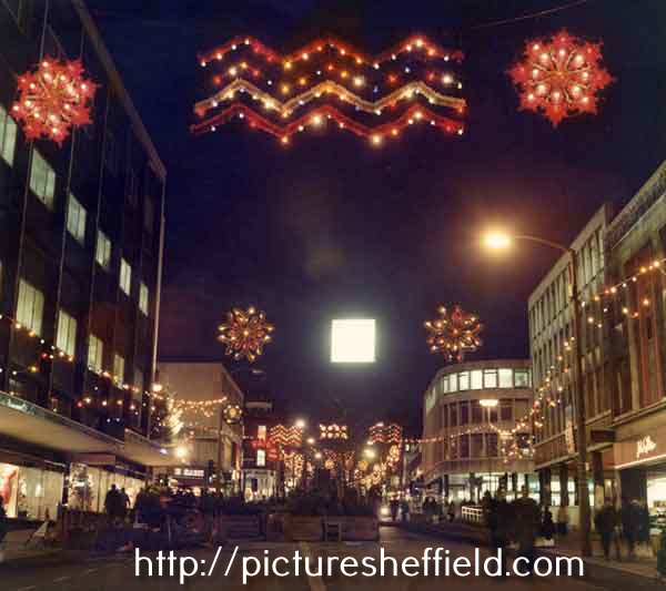 Christmas lights on The Moor showing (left) Debenhams, department store