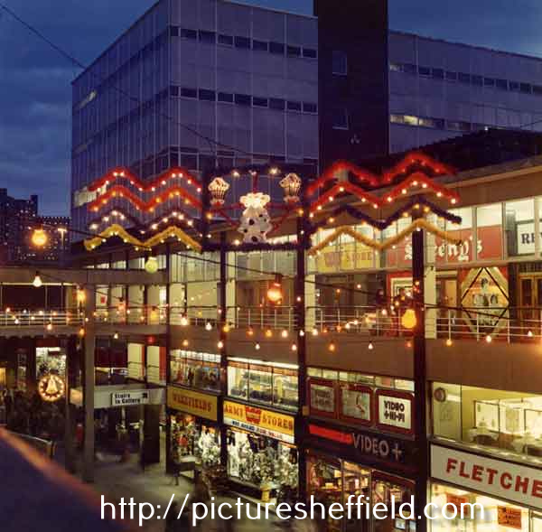 Christmas lights on Exchange Street showing shops on The Gallery, Castle Market