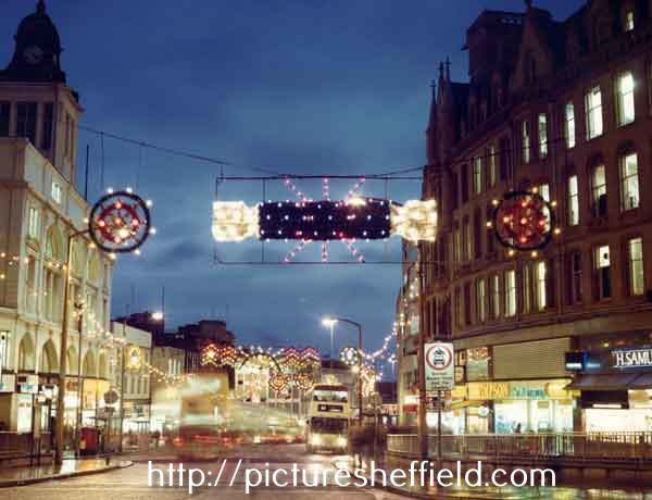 Christmas decorations on High Street at junction with (foreground) Fargate showing (right) William Timpson Ltd., shoe shop and H.Samuel, jeweller