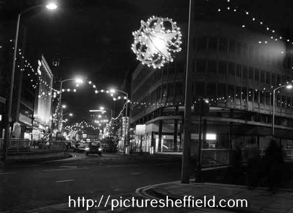 Christmas decorations in Fargate at the junction with (foreground) High Street showing (centre) East Midland Gas Board Showroom, Coles Corner
