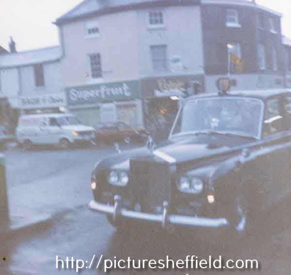 Possibly Queen's car on Bradfield Road showing (left) No.151 Superfruit, grocers
