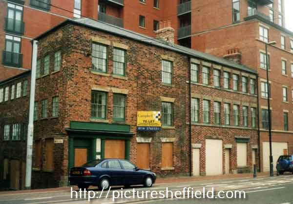 Former premises of Mortons cutlers, No. 100 West Street at junction with (left) Bailey Lane