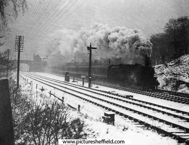 'Fighting the Blizzard' the Night Mail in Yorkshire snowstorm possibly passing Beauchief and Abbeydale Station
