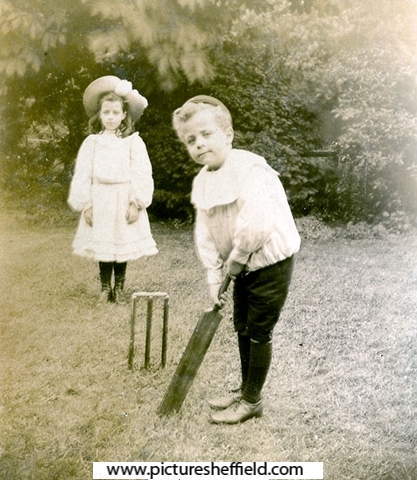 Dorothy Caroline Barr playing cricket with her brother Harold Frederick Barr, c. 1908