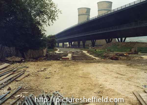 Construction of Supertram River Don bridge below Tinsley Viaduct showing (back) Tinsley Cooling Towers 