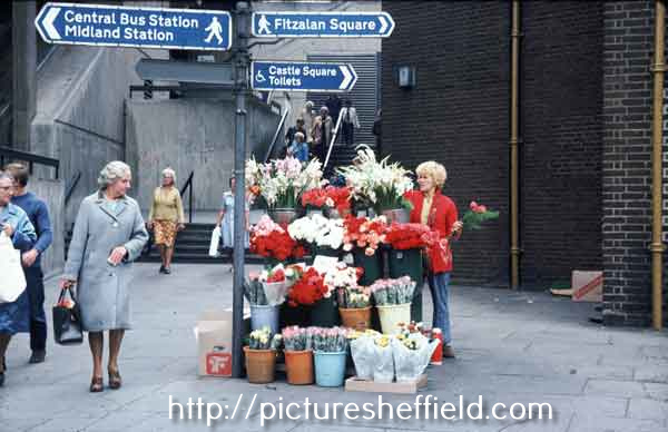 Flower seller at junction of Flat Street and Pond Street