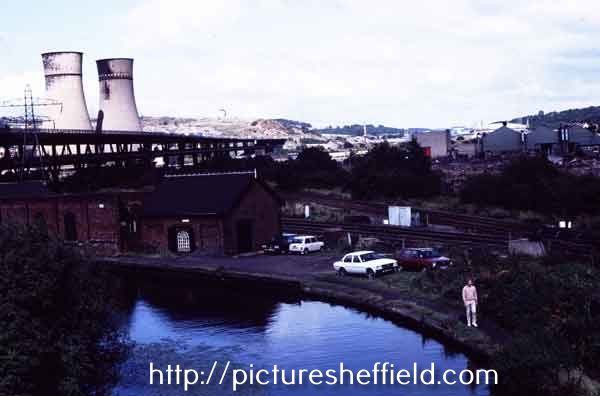 View of the Sheffield and South Yorkshire Navigation showing (left) the Tinsley Cooling Towers and M1 motorway