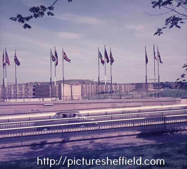 Flags on Arundel Gate looking towards Park Hill flats