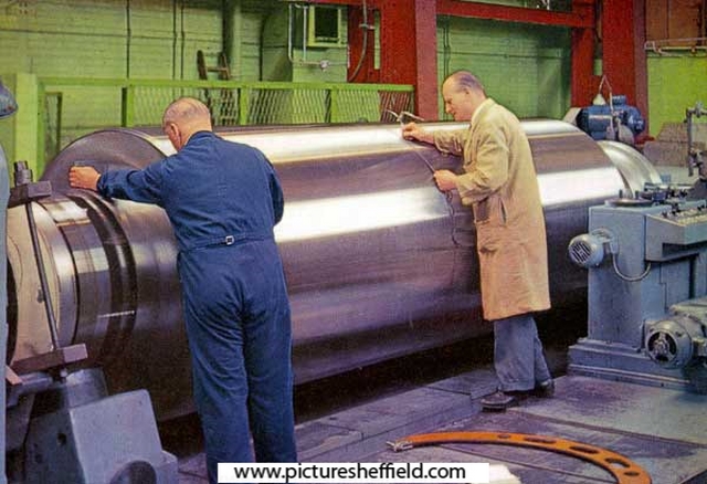Inspecting a one-piece forged steel back up roll , 1950s