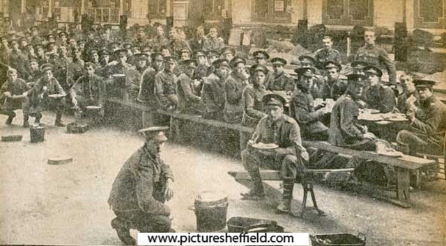 Men of 5th Battalion King's Own Yorkshire Light Infantry (KOYLI) (T) at dinner at the Sheffield Olympia