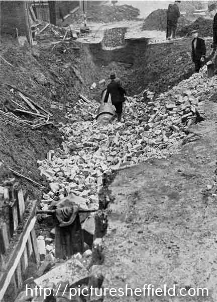 Brook Hill showing the aftermath of a high explosive bomb on a 24 inch water main on 12th December, 1940