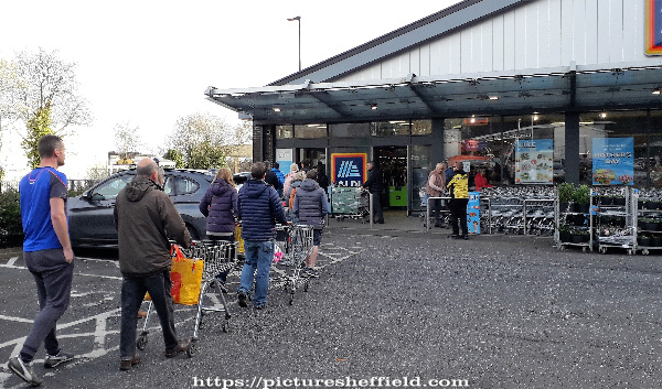 Covid-19 pandemic: queuing to get into the Aldi supermarket, Archer Road