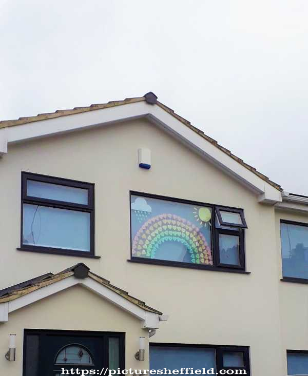 Covid-19 pandemic: rainbow window art supporting the NHS, Millhouses Lane