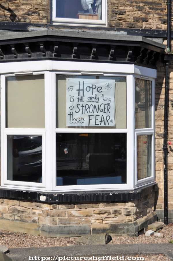 Covid-19 pandemic: sign in a house window - Hope is the only thing stronger than fear