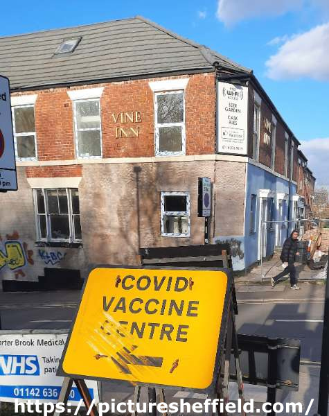 Covid-19 pandemic: sign for vaccination centre, Cemetery Road