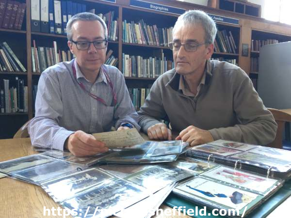 Pete Evans, Archives and Heritage Manager (left) and Andrew Milroy, Picture Sheffield volunteer (right) at the Local Studies Library, Central Library, Surrey Street