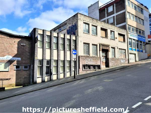 Derelict building on Lee Croft showing (left) Central Elim Pentecostal Church and (right) Mace Store, convenience shop, No. 66 Campo Lane