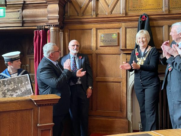 Unveiling of a plaque commemorating the Sheffield City Battalion in the Council Chamber of Sheffield Town Hall