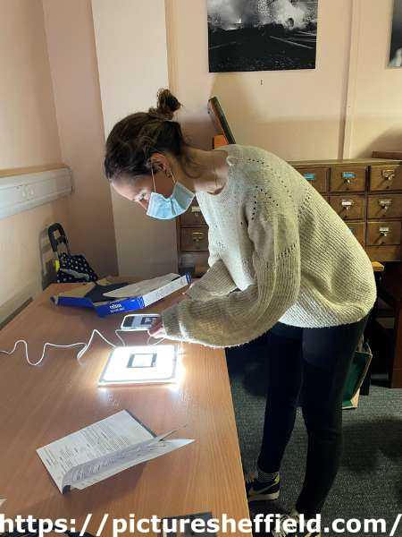 Gemma Thorpe (Photographer) digitising glass slides at Sheffield City Archives