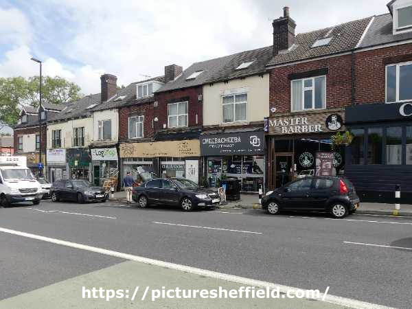 Shops on Chesterfield Road showing (l. to r.) No. 105 The Log Shop; Nos. 107 - 109 Spinning Discs, vinyl record shop; No. 111 Cheeba Chuba, cafe and No. 113 Master Barber 